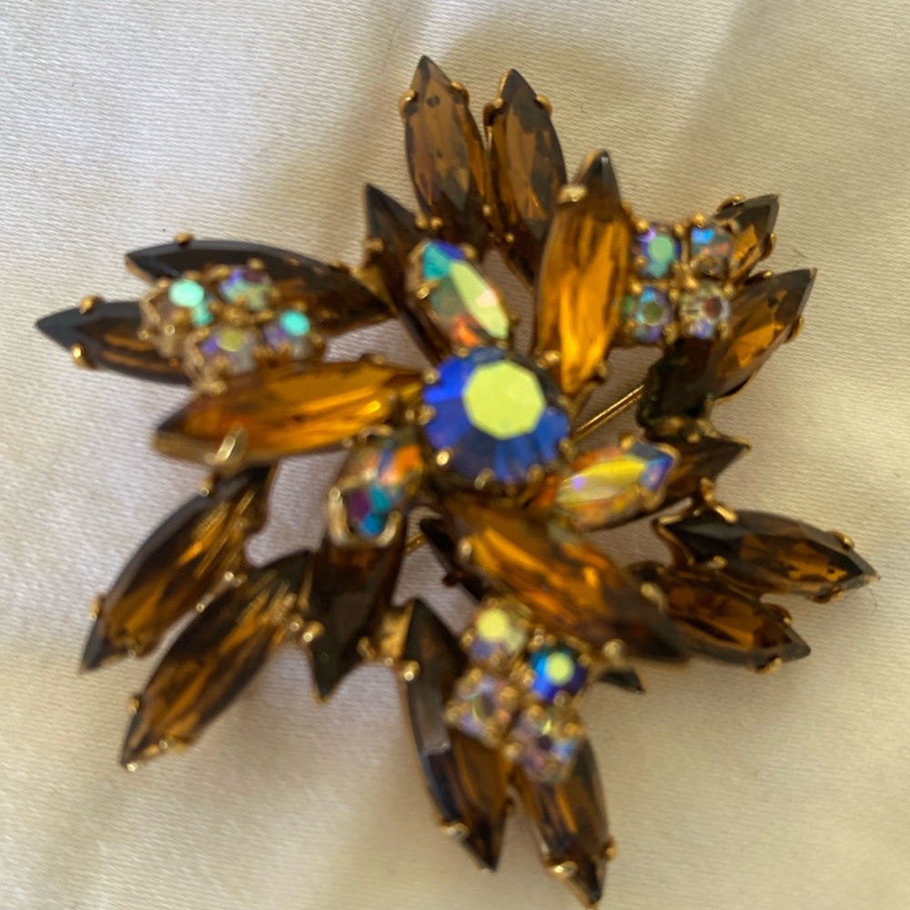 Beautiful vintage Amber and blue and white rhinestones.